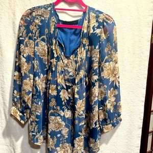 Flowing hip length blouse